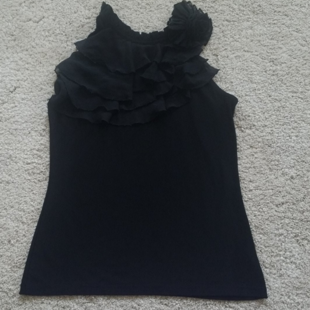 Sleeveless, black shirt